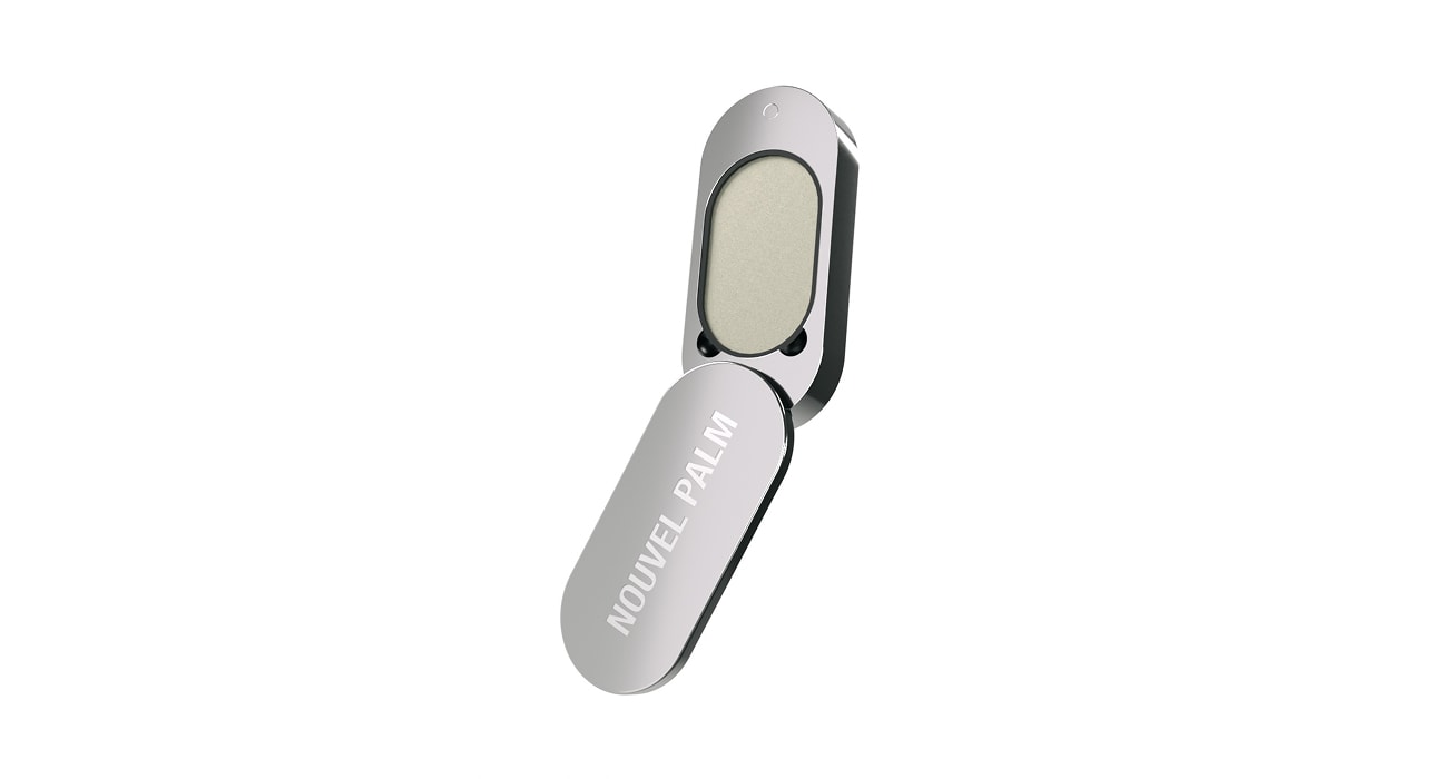 The NOUVEL PALM compact, open, showing the fragrance pod